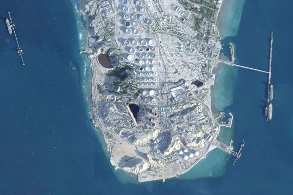 Satellite view of Kharg Island oil jetties;Kharg Island's importance ; An oil supertanker docking at Kharg; Anti-aircraft fire over the Persian Gulf.