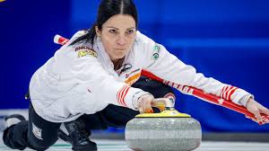 Kerri Einarson delivering a stone in Calgary; Women's Curling Championship ;The Canadian flag in the stands at WinSport; A scoreboard showing Canada 11, USA 3.