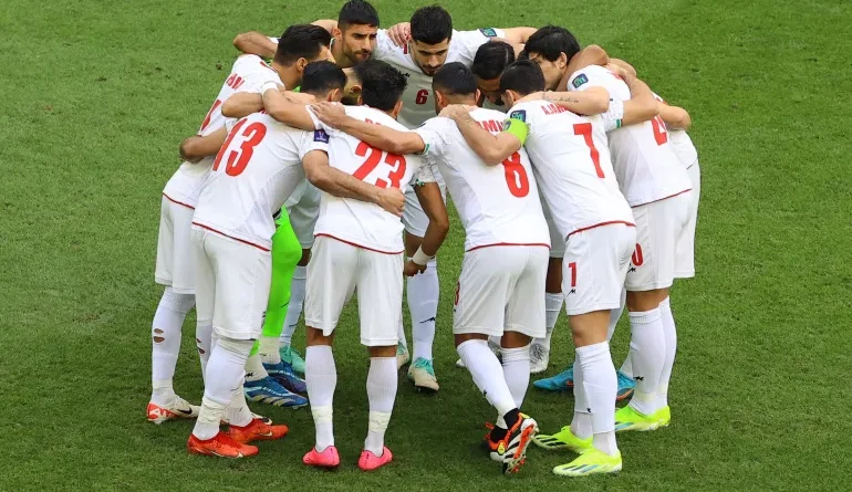 The Iranian national football team logo;Iran Officially Boycotts 2026; FIFA President Gianni Infantino with Donald Trump; A stadium in Los Angeles prepared for 2026.