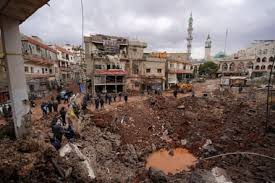 Rubble of the Hamdan family home in Al-Nimiriya; Smoke rising over Nabatieh after an airstrikeIsrael Lebanon war;; Displaced families in tents at Ramlet al-Baida.