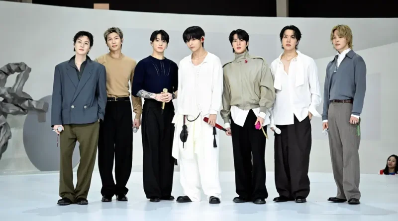 BTS members performing on stage during their global tour following their Grammy decision