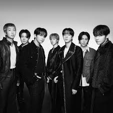 BTS performing on stage at a past Grammy Awards ceremony prior to video removals