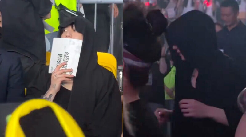 BTS member Jungkook wearing sunglasses caught at a Stray Kids concert event